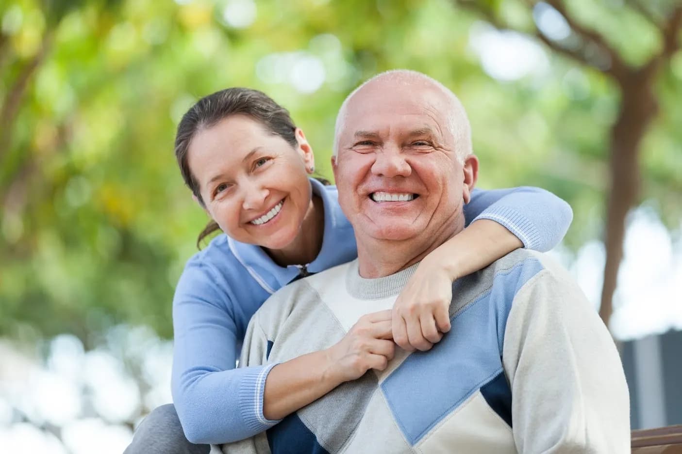 Dentist discussing halitosis treatment with a patient in Banff